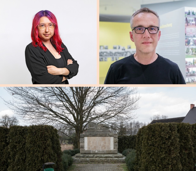 zwei Personen und ein Denkmal